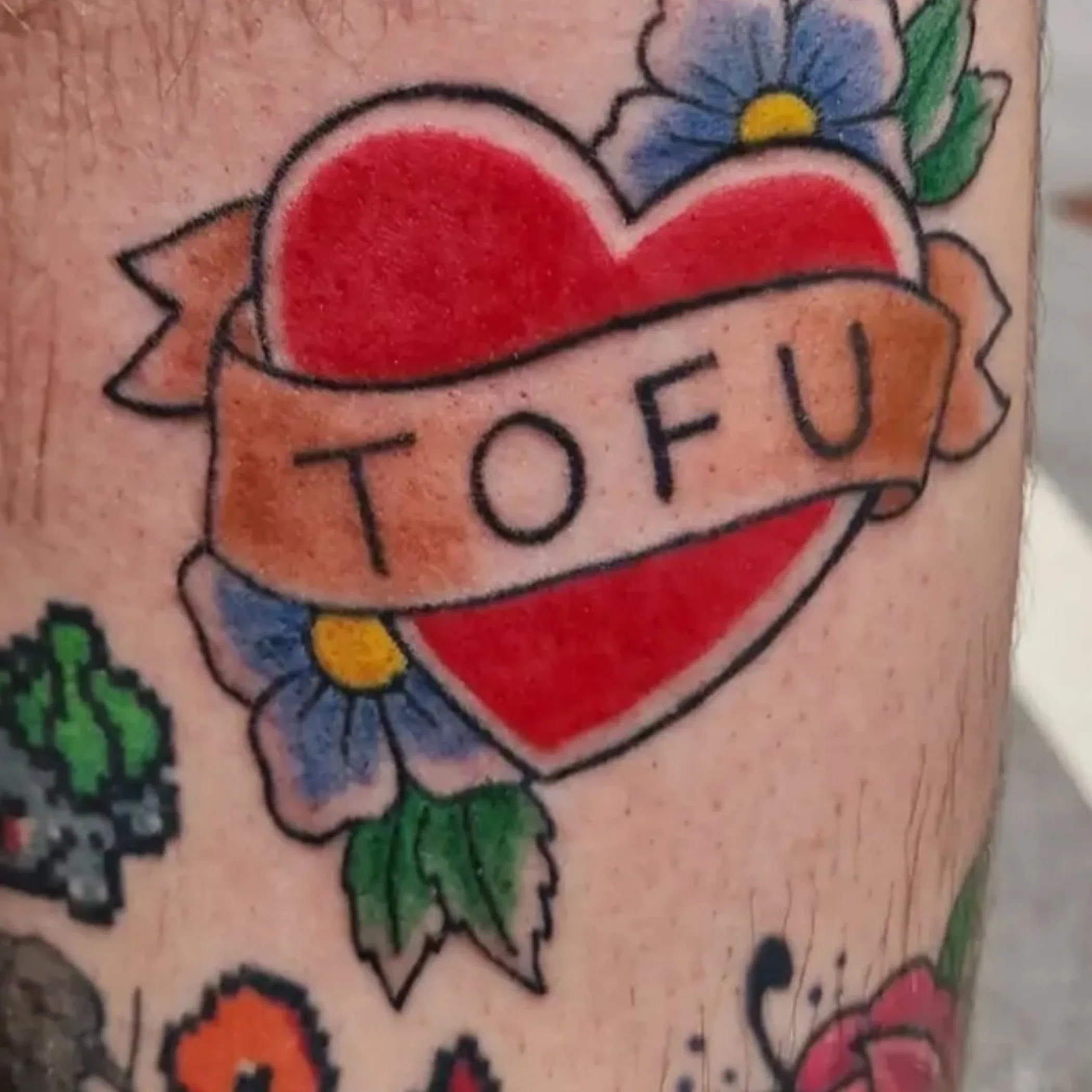 tattoo of tofu heart symbol