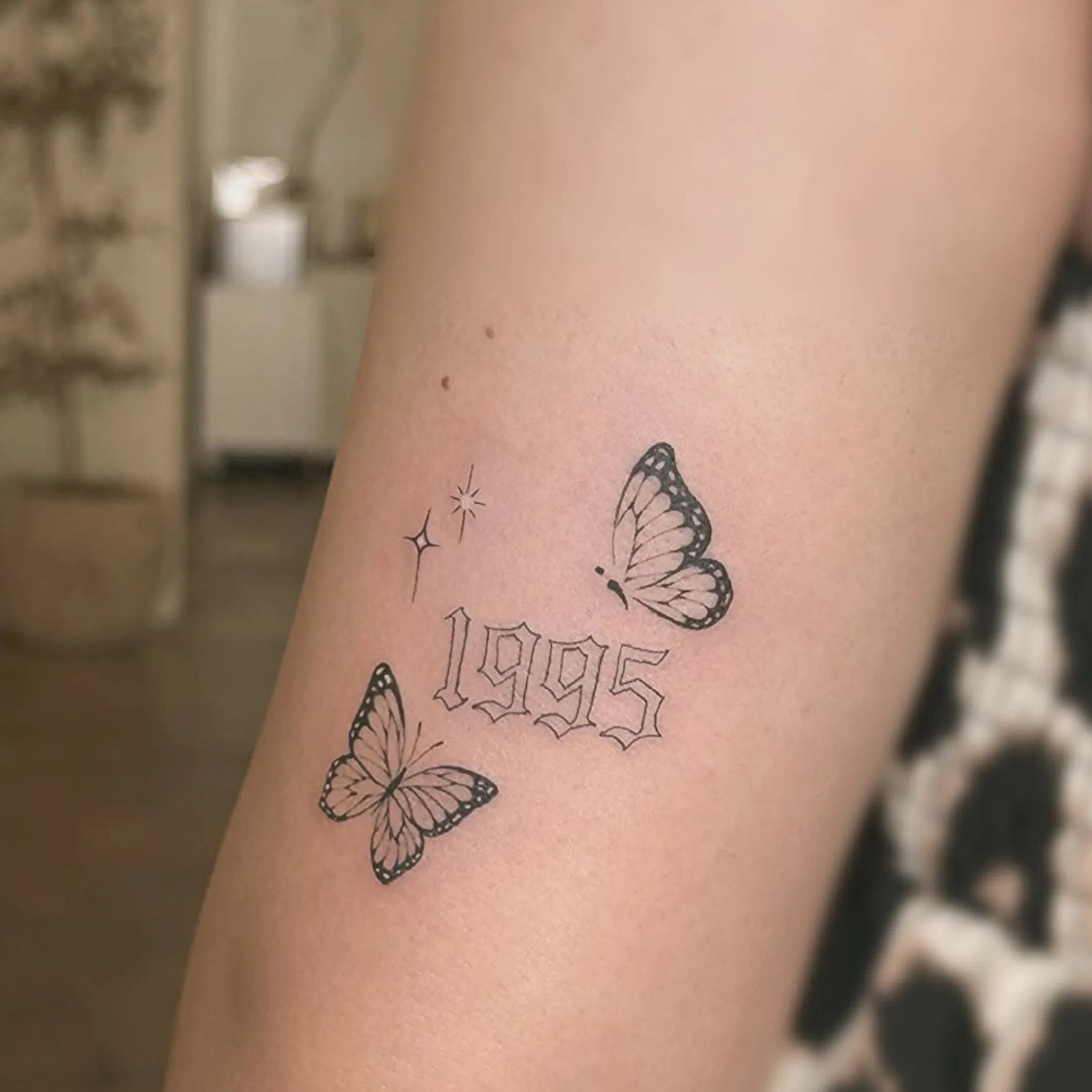 tattoo with butterflies and numbers