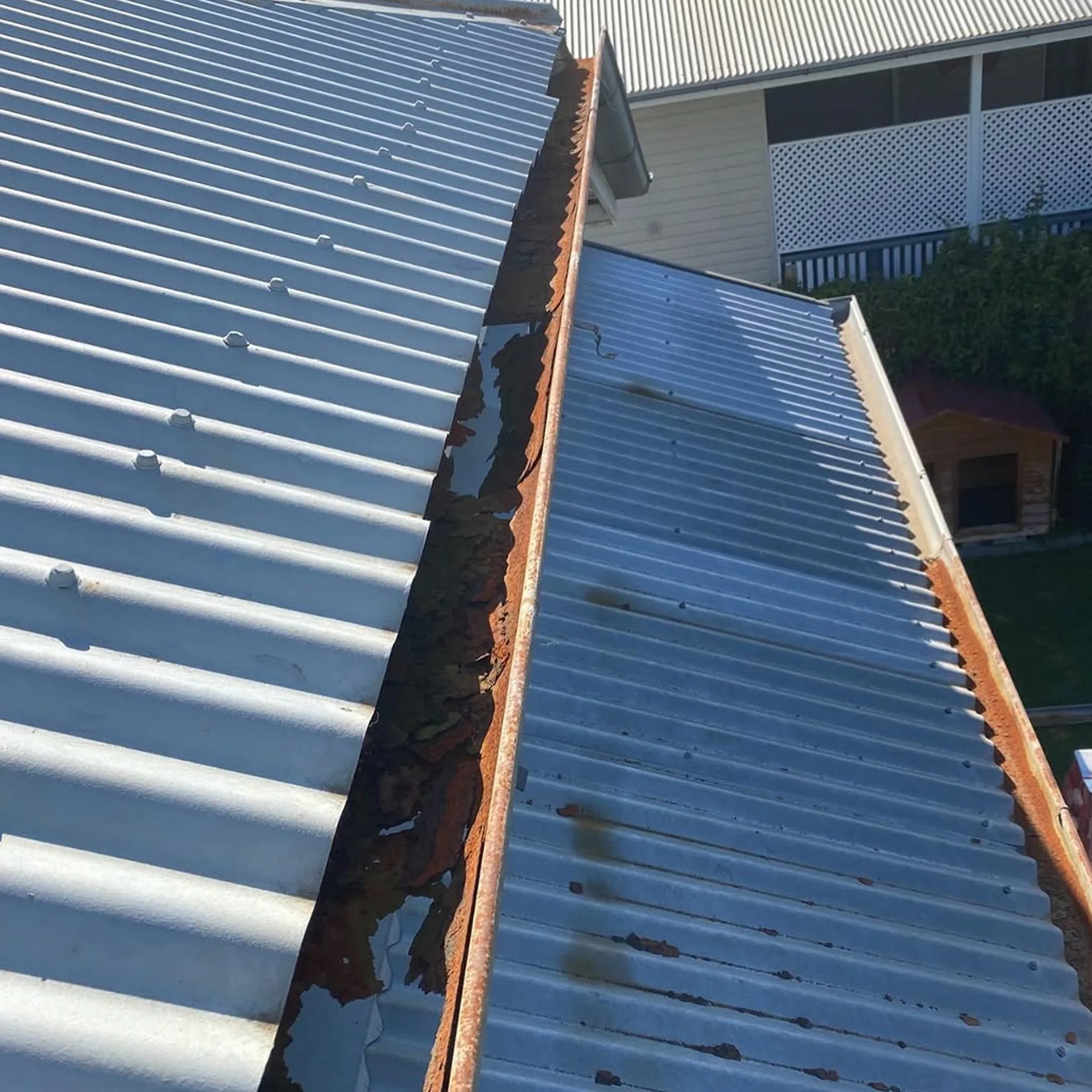 corroded roof gutters needing seasonal care