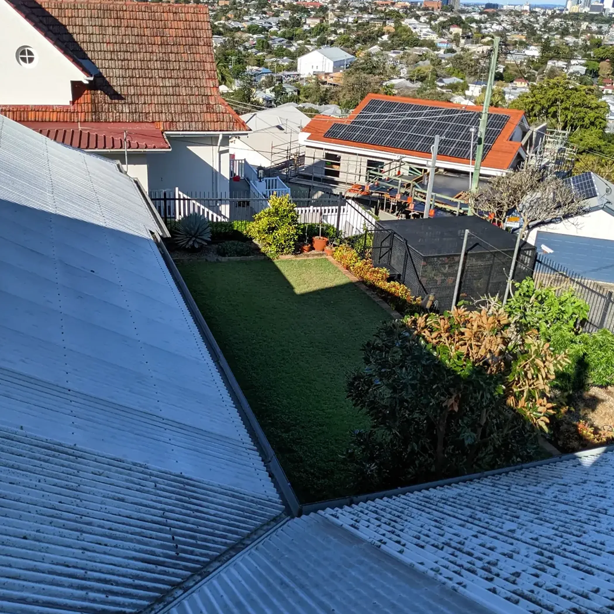 rooftop gutters during seasonal leaf fall